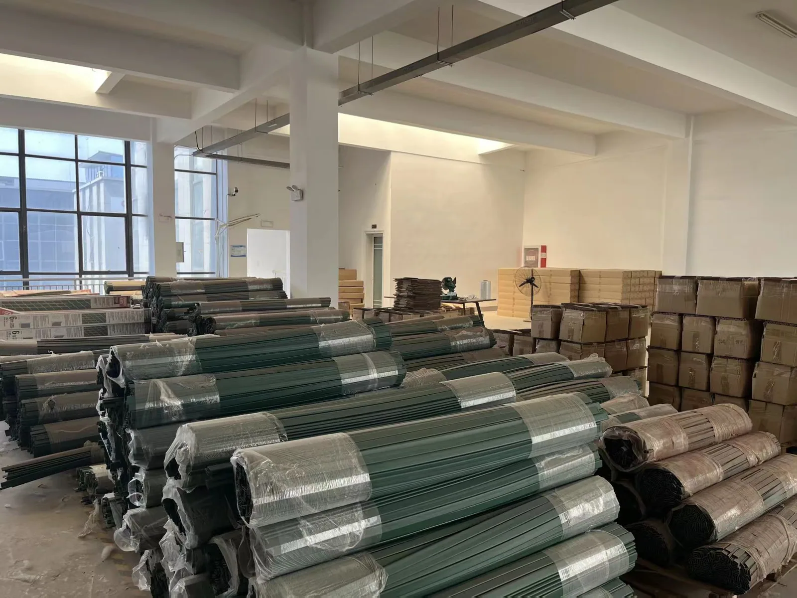 Organized warehouse of aquaponics profiles and packaged components ready for shipment